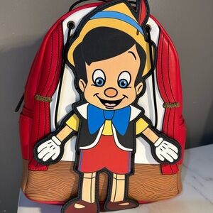 Loungefly Pinocchio Character Backpack animated arms